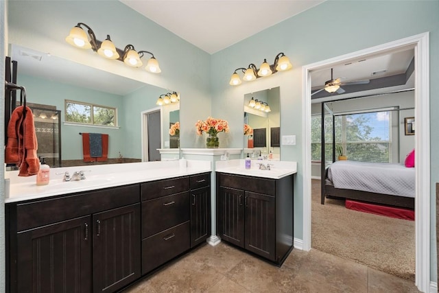 109 Lombardia Dr, Lakeway, TX 78734 - ensuite bathroom featuring vanity, a ceiling fan, and tile patterned flooring