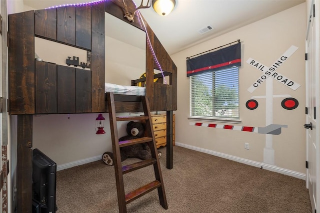 109 Lombardia Dr, Lakeway, TX 78734 - carpeted bedroom featuring baseboards