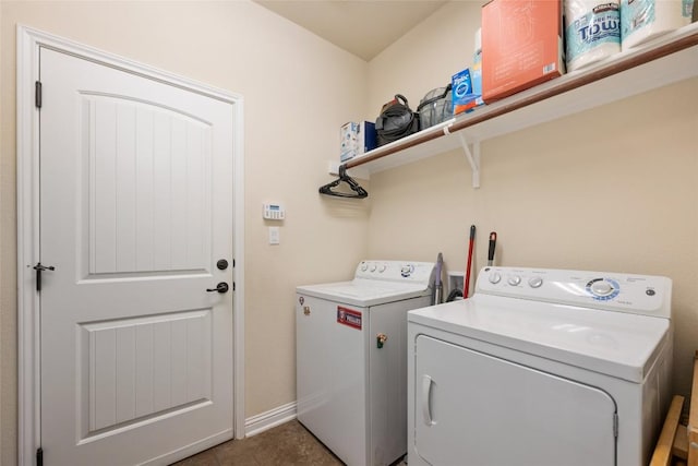 109 Lombardia Dr, Lakeway, TX 78734 - laundry room with washer and dryer and baseboards