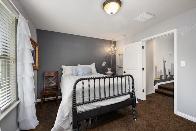 109 Lombardia Dr, Lakeway, TX 78734 - bedroom with carpet flooring and baseboards