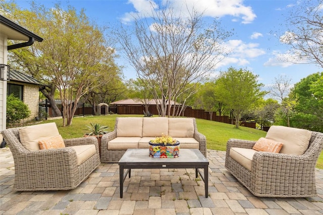 view of patio featuring a fenced backyard and outdoor lounge area