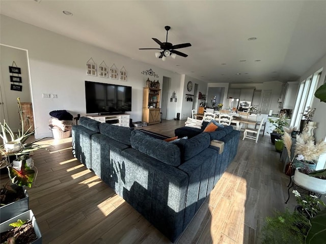 145 Cyrus Milton Dr, Buda, TX 78610 - living room with ceiling fan, dark wood-style flooring, and recessed lighting