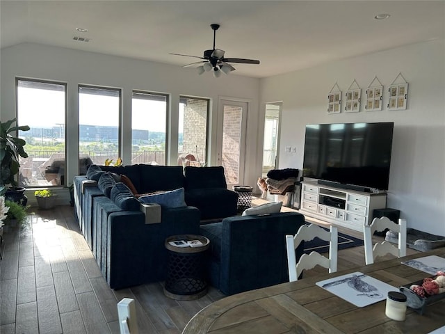 145 Cyrus Milton Dr, Buda, TX 78610 - living room featuring ceiling fan, wood finished floors, and lofted ceiling