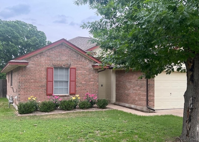 506 Clearcreek Dr, Leander, TX 78641 - view of front of property with a front yard, a garage, and brick siding
