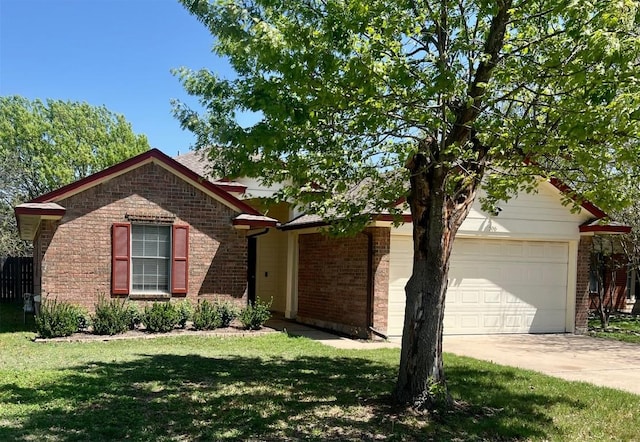 506 Clearcreek Dr, Leander, TX 78641 - ranch-style house featuring brick siding, a garage, driveway, and a front lawn