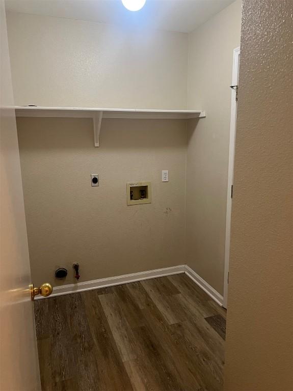 506 Clearcreek Dr, Leander, TX 78641 - washroom featuring wood finished floors, washer hookup, hookup for a gas dryer, electric dryer hookup, and baseboards