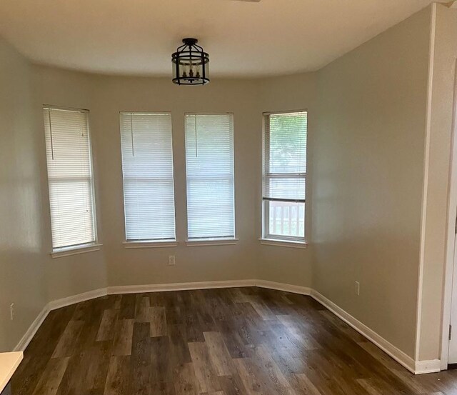 506 Clearcreek Dr, Leander, TX 78641 - unfurnished room with dark wood-style floors and baseboards