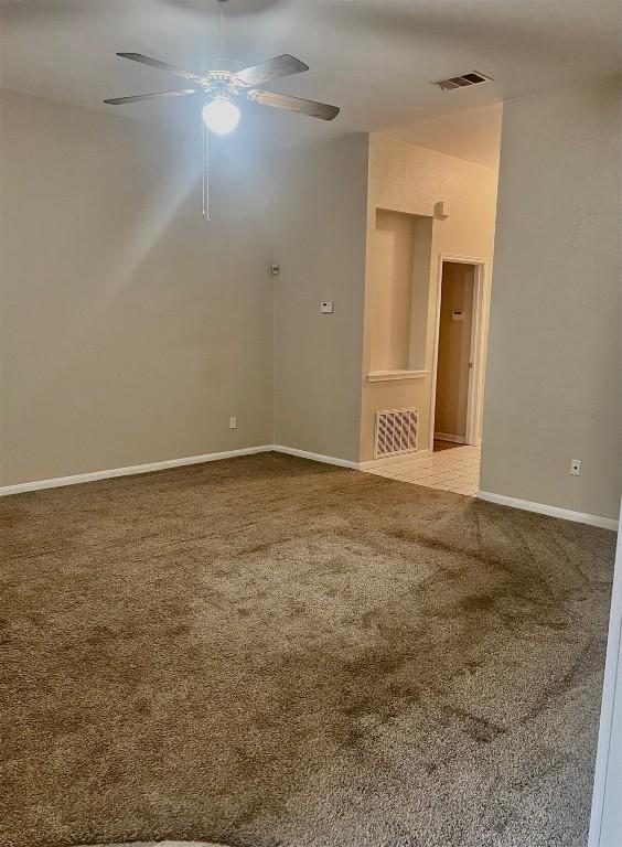 506 Clearcreek Dr, Leander, TX 78641 - empty room featuring carpet flooring, ceiling fan, and baseboards
