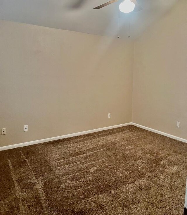 506 Clearcreek Dr, Leander, TX 78641 - unfurnished room featuring ceiling fan, carpet, and baseboards