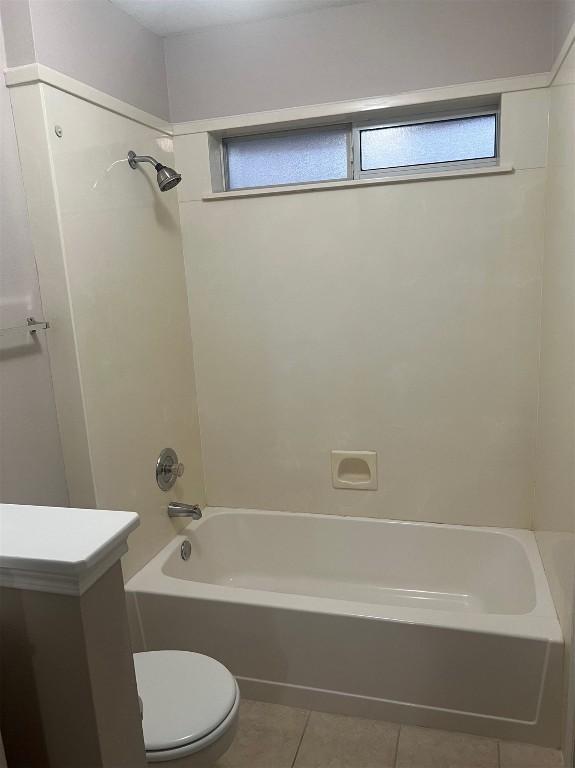 506 Clearcreek Dr, Leander, TX 78641 - full bath featuring toilet, tile patterned flooring, and bathtub / shower combination
