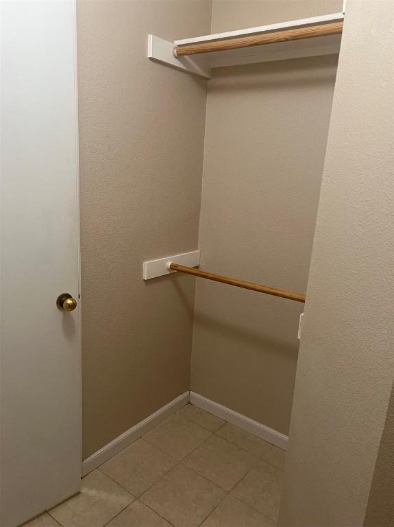 506 Clearcreek Dr, Leander, TX 78641 - walk in closet with light tile patterned floors