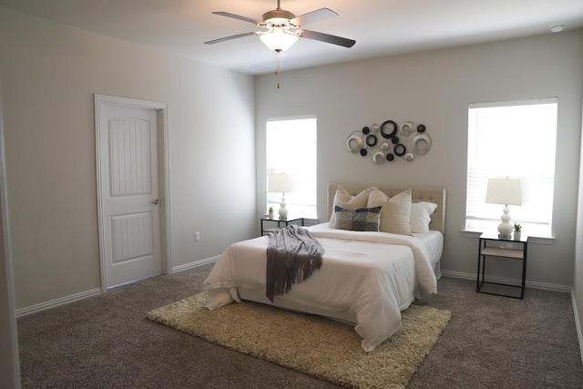8801 Mina Dr, Austin, TX 78747 - bedroom featuring multiple windows, carpet flooring, and a ceiling fan