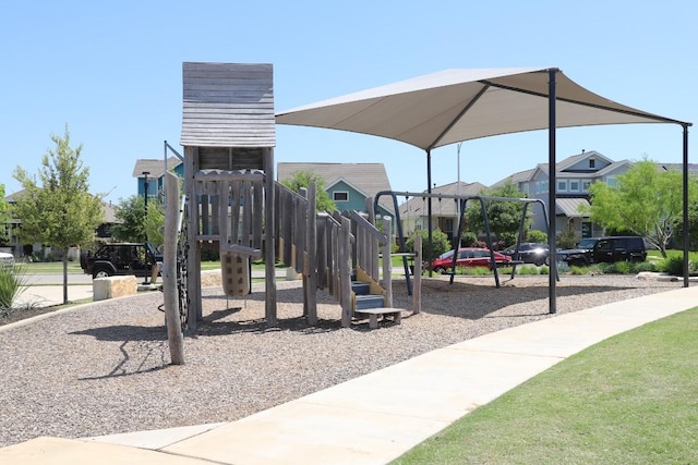 8801 Mina Dr, Austin, TX 78747 - communal playground featuring a residential view