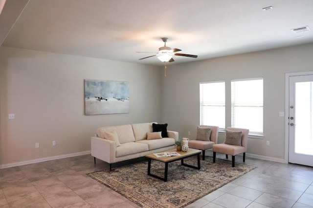 8801 Mina Dr, Austin, TX 78747 - living area with a ceiling fan and baseboards