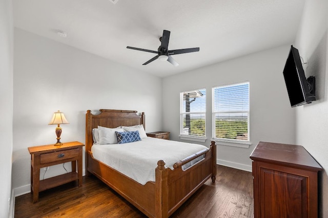 622 Galston Dr, Spicewood, TX 78669 - bedroom with dark wood-style floors and ceiling fan