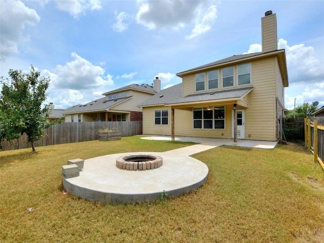4228 Rolling Water Dr, Pflugerville, TX 78660 - back of house featuring a chimney, an outdoor fire pit, a patio area, and a shingled roof