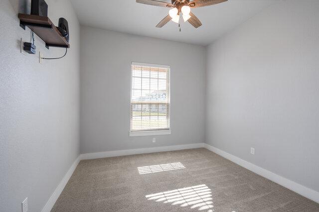 3401 Bandit Ct, Kempner, TX 76539 - unfurnished room featuring a ceiling fan and carpet