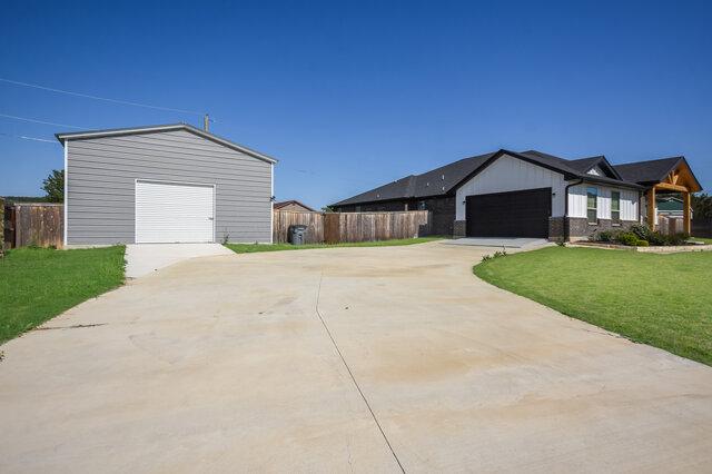 3401 Bandit Ct, Kempner, TX 76539 - view of front facade featuring concrete driveway and a garage