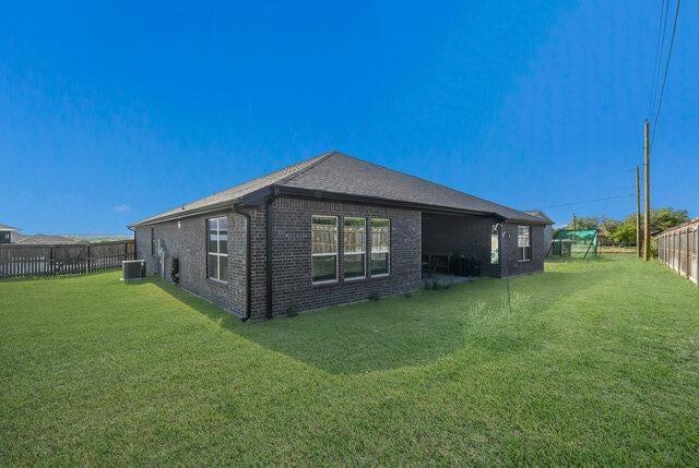 3401 Bandit Ct, Kempner, TX 76539 - view of side of property featuring brick siding and a fenced backyard