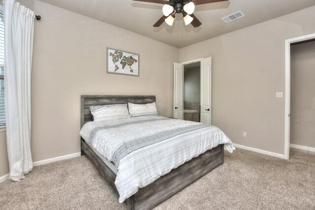 1706 Ambling Trl, Cedar Park, TX 78613 - carpeted bedroom featuring baseboards and a ceiling fan