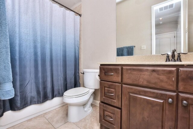 1706 Ambling Trl, Cedar Park, TX 78613 - full bath with tile patterned flooring, toilet, vanity, and shower / bath combo with shower curtain