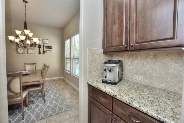 1706 Ambling Trl, Cedar Park, TX 78613 - dining area with a chandelier and baseboards