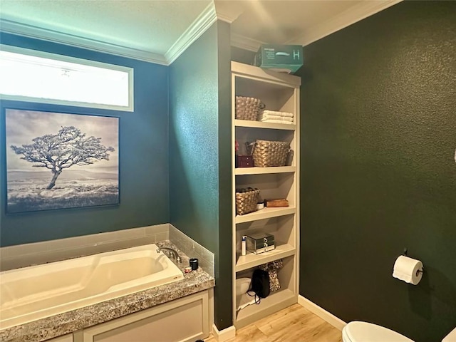 1021 Lewis Ln, Harwood, TX 78632 - full bathroom featuring ornamental molding, a bath, wood finished floors, and a textured wall