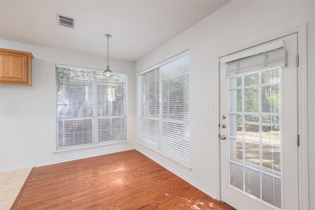 6008 Sierra Leon St, Austin, TX 78759 - unfurnished dining area featuring baseboards