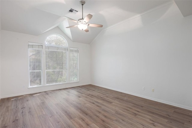 6008 Sierra Leon St, Austin, TX 78759 - spare room with wood finished floors, a ceiling fan, and vaulted ceiling