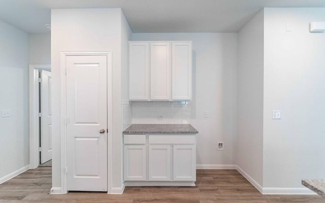510 Timber Brook Dr, Hutto, TX 78634 - interior space featuring light wood-style floors, washer hookup, baseboards, and laundry area