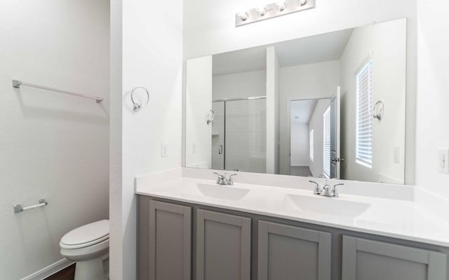 108 Biscayne Dr, Hutto, TX 78634 - full bath featuring a sink, a shower stall, double vanity, and toilet