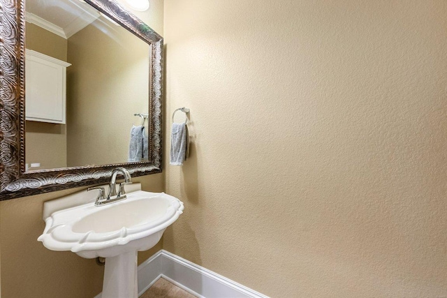 901 Middle Brook Dr, Leander, TX 78641 - bathroom featuring crown molding and a sink