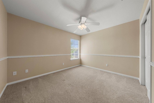 901 Middle Brook Dr, Leander, TX 78641 - unfurnished bedroom with carpet flooring, baseboards, and a ceiling fan