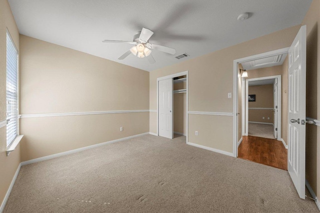 901 Middle Brook Dr, Leander, TX 78641 - unfurnished bedroom with baseboards, a closet, carpet flooring, attic access, and visible vents