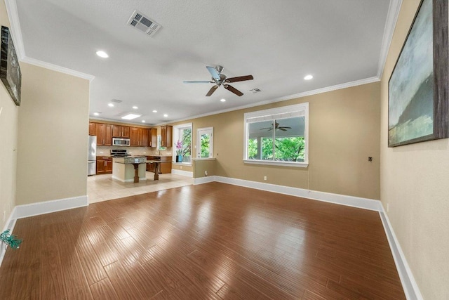 901 Middle Brook Dr, Leander, TX 78641 - unfurnished living room featuring visible vents, ceiling fan, recessed lighting, and baseboards
