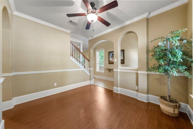 901 Middle Brook Dr, Leander, TX 78641 - interior space featuring baseboards, ornamental molding, visible vents, ceiling fan, and wood finished floors