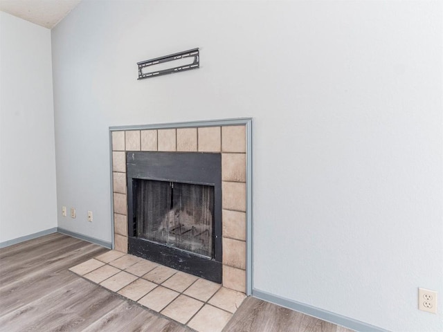 9624 Sugar Hill Dr Unit A & B, Austin, TX 78748 - detailed view of wood finished floors and a tile fireplace