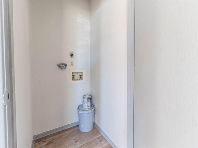 9624 Sugar Hill Dr Unit A & B, Austin, TX 78748 - washroom featuring washer hookup, hookup for an electric dryer, and light wood finished floors