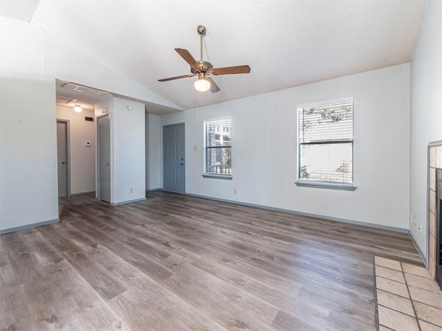 9624 Sugar Hill Dr Unit A & B, Austin, TX 78748 - unfurnished living room with attic access, a ceiling fan, vaulted ceiling, and light wood-style floors