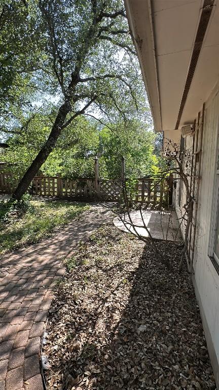 view of yard with a patio area and fence