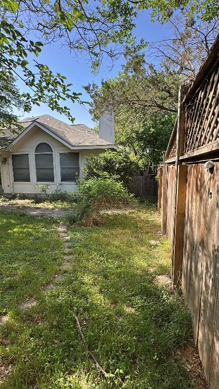 view of yard featuring fence
