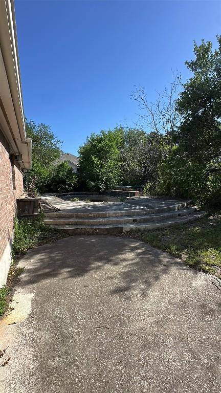 view of road featuring driveway