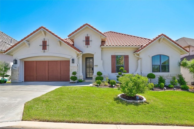 19605 Summit Glory Trl Unit 107, Spicewood, TX 78669 - mediterranean / spanish home with stone siding, a tile roof, driveway, and a front yard