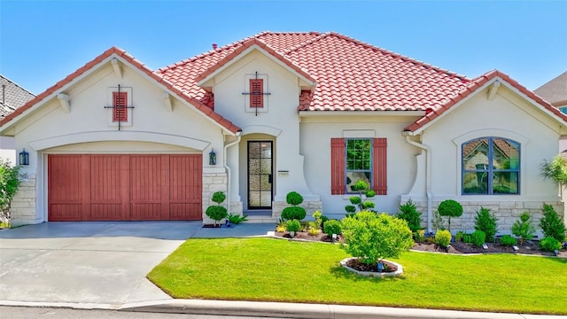 19605 Summit Glory Trl Unit 107, Spicewood, TX 78669 - mediterranean / spanish home with concrete driveway, a front lawn, stone siding, a tiled roof, and a garage