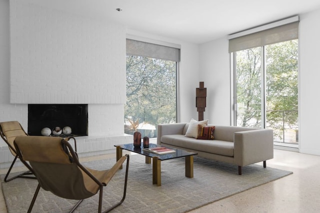 5204 Ridge Oak Dr, Austin, TX 78731 - living room with speckle patterned floor and a fireplace