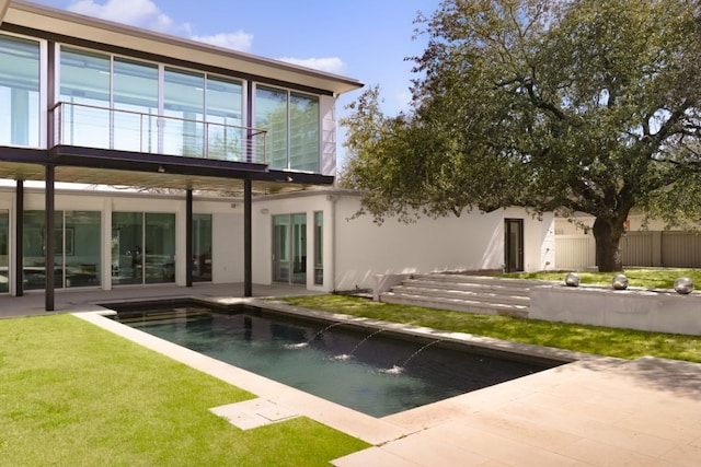 5204 Ridge Oak Dr, Austin, TX 78731 - back of property with a patio area and stucco siding