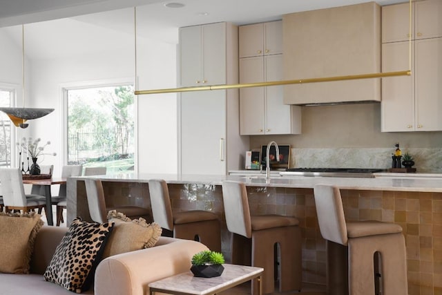 2809 Waterbank Cv, Austin, TX 78746 - kitchen with light countertops and stainless steel gas cooktop