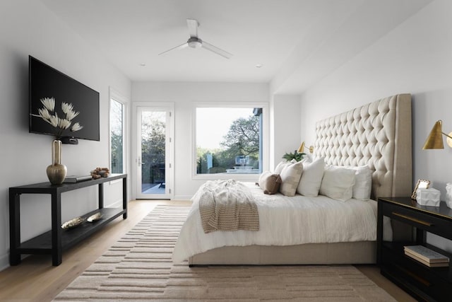 2809 Waterbank Cv, Austin, TX 78746 - bedroom featuring access to outside, wood finished floors, and a ceiling fan
