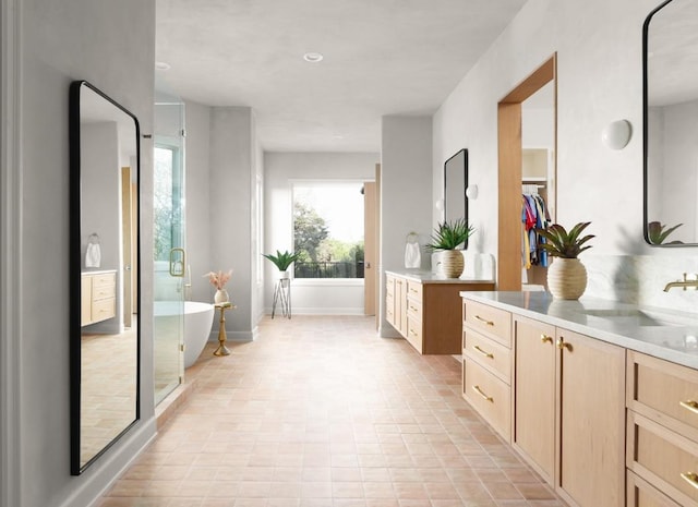 2809 Waterbank Cv, Austin, TX 78746 - full bathroom featuring vanity, a freestanding tub, and a stall shower