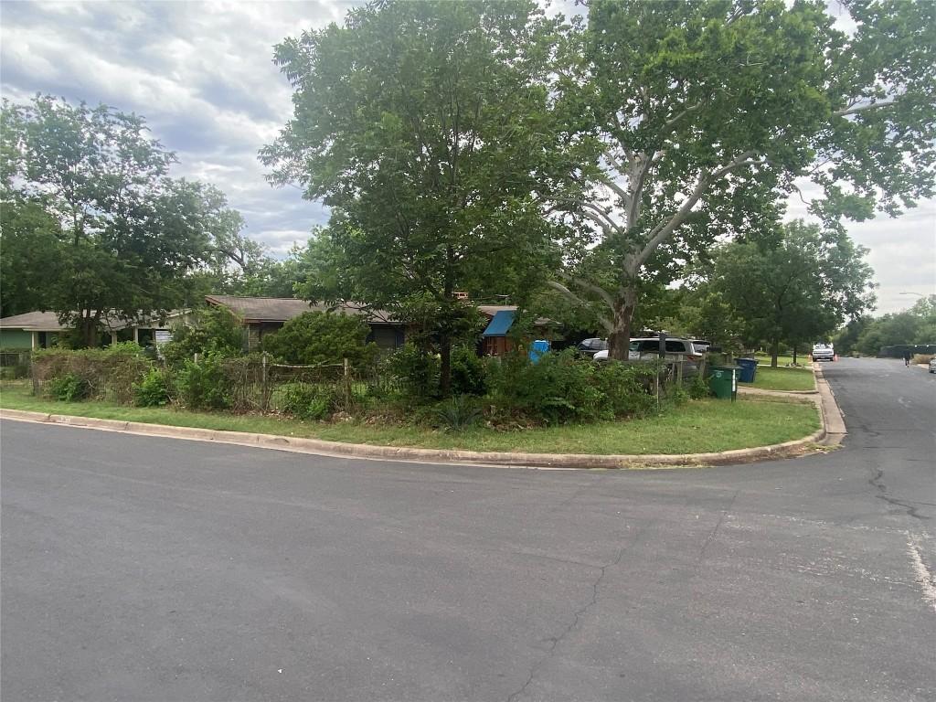 4623 Philco Dr, Austin, TX 78745 - view of asphalt road with curbs